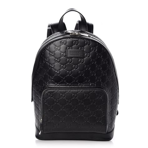 gucci black small backpack.